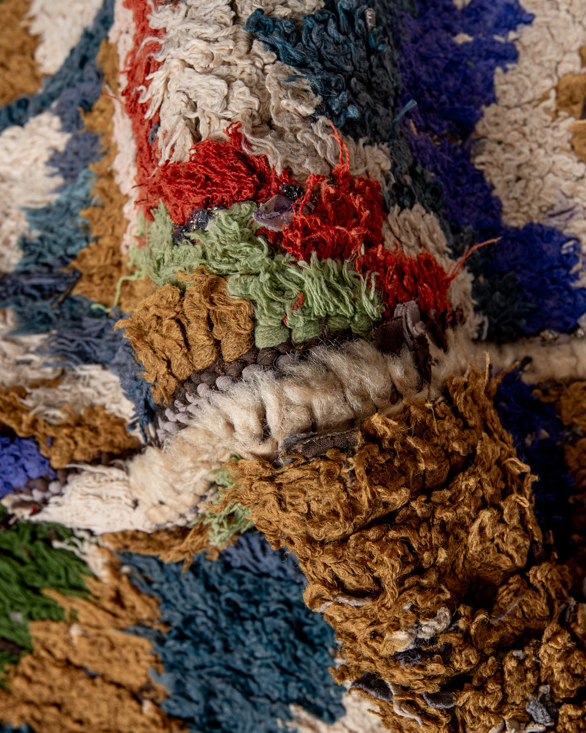Modern designer vintage handcrafted Berber rug from Morocco. Boucherouite with beautiful colors and patterns.